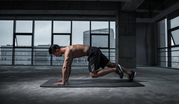 A men working out on a mat