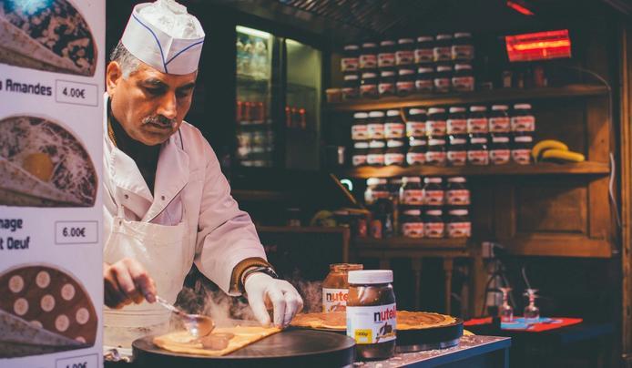 A person making pancakes