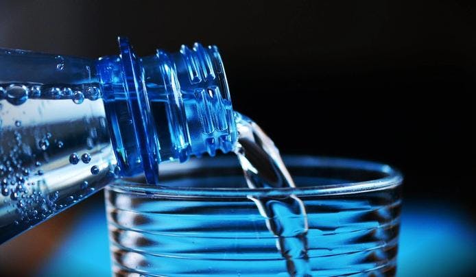 A water being poured in a glass